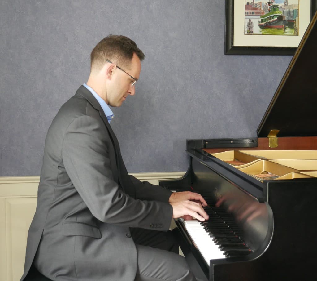Greg Fiorentino playing a Boston grand piano